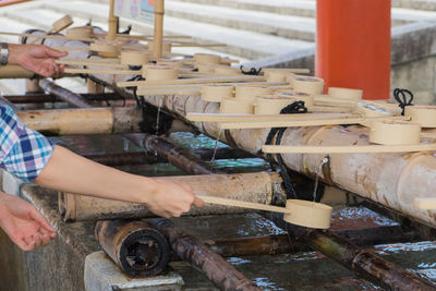 Close-up of man working in container