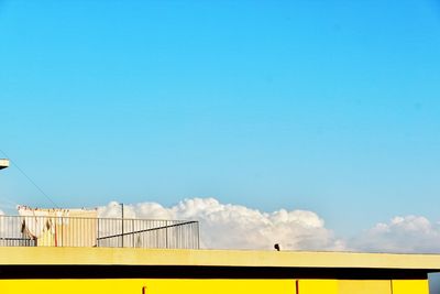 Low angle view of built structure against blue sky