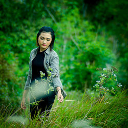 Portrait of woman on grass