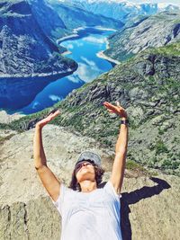 Woman relaxing on mountain