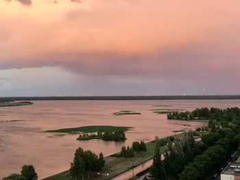 High angle view of sea against sky during sunset