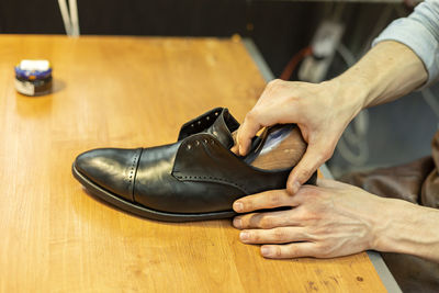 Close-up of man working on table