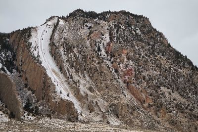 Rock formation on land against sky