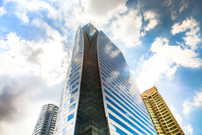 Low angle view of modern buildings against sky