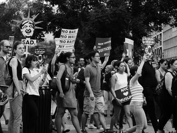 Group of people on street in city
