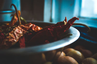 Close-up of meat in plate on table at home