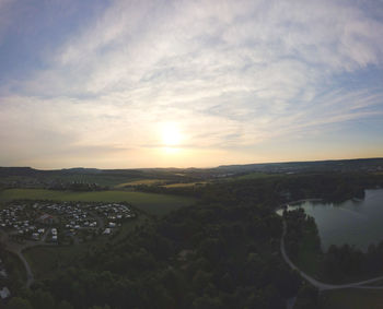 Scenic view of landscape against sky during sunset