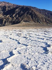 Scenic view of desert against sky