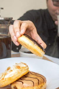 Midsection of man preparing food