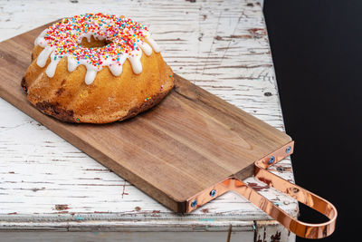 High angle view of cake on cutting board
