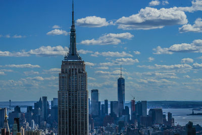 Modern buildings in city against sky