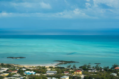 Scenic view of sea against blue sky