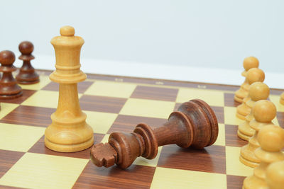 Close-up of chess against white background