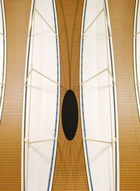 Low angle view of glass ceiling in building