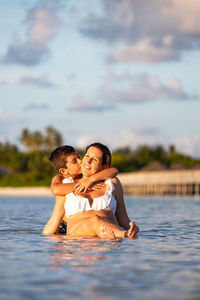 Full length of woman swimming in sea