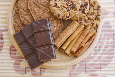 Close-up of cookies with chocolates on table