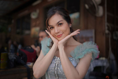 Portrait of young woman looking away