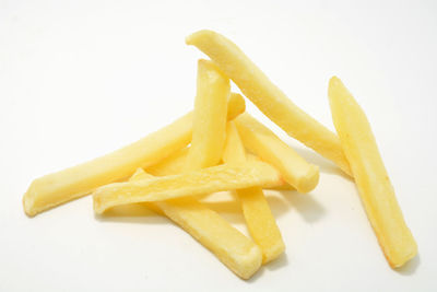 High angle view of fresh yellow pepper against white background