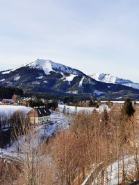 Scenic view of snowcapped mountains against sky