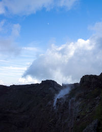 View of landscape against cloudy sky