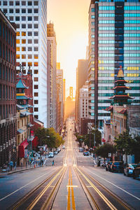 City street amidst buildings against sky