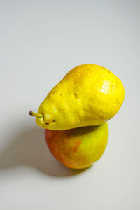 Close-up of lemon slice against white background