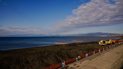 Scenic view of beach against sky