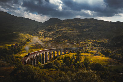 High angle view of bridge against cloudy sky