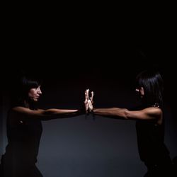 Multiple image of woman with arms raised