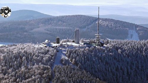 Panoramic view of mountains against sky during winter