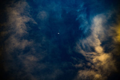 Low angle view of moon in sky