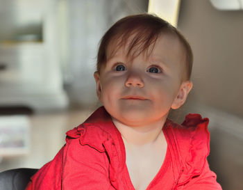 Portrait of cute baby boy at home