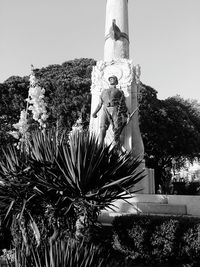 Low angle view of statue against sky