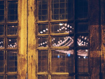 Close-up of window hanging at night