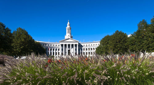 Temple against clear blue sky