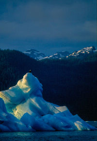 Scenic view of snow covered mountains