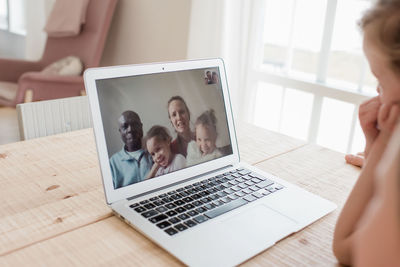 Video call with family staying in touch at home