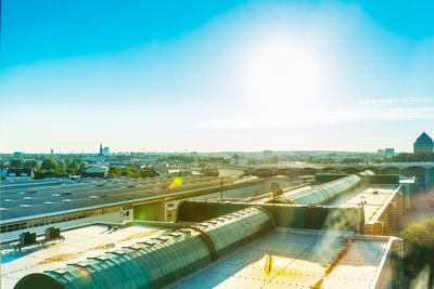 High angle view of industry against sky on sunny day