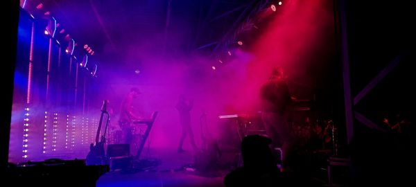 Panoramic view of crowd at music concert