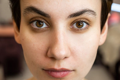 Close-up portrait of young woman