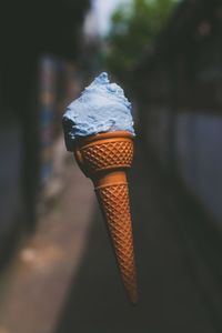 Levitating blue ice cream cone