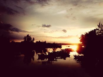 Scenic view of sunset over lake