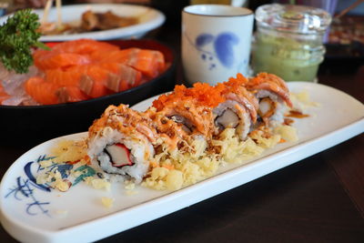 Close-up of sushi served on table