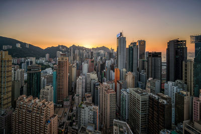 Aerial view of city during sunset