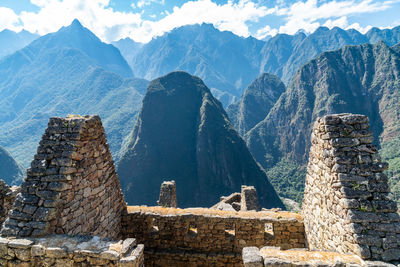 View of castle against mountain range