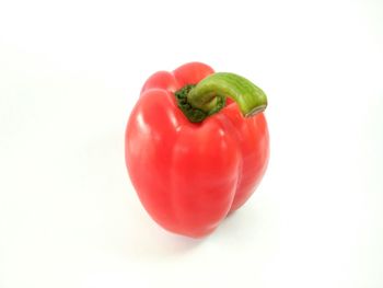 Close-up of bell peppers against white background