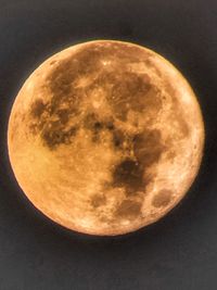 Low angle view of moon against sky at night