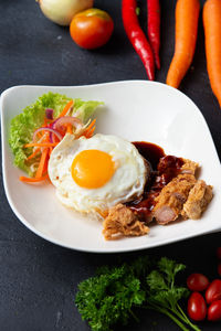 High angle view of breakfast served on table