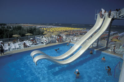 High angle view of swimming pool in city