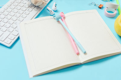 High angle view of book on table